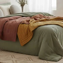 Plaids, coussins et édredons coordonnés en pack déco cocooning